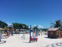 Cozy and Charming House with Pool and Gardens in a Beachfront Condominium!