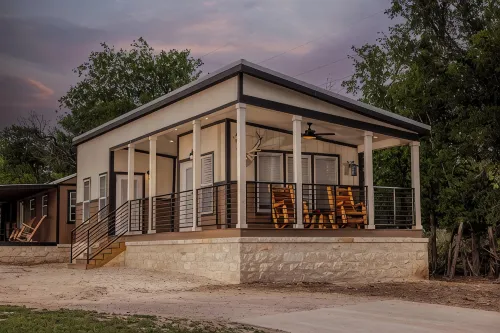 Tranquil Lakefront Retreat: 1BR Cabin with Covered Patio & Private Dock