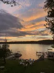 Relax in Raymond's lakefront 2-bedroom vacation home, just steps to Sebago Lake