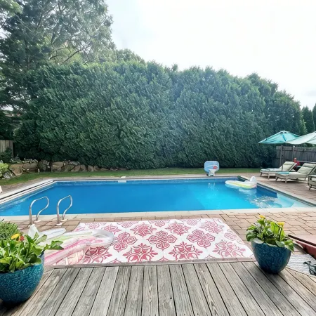 Spacious 5Bdrm Home- Saltwater Pool, WiFi, AC, Private Beach Parking Pass