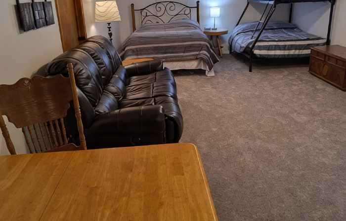 Beautiful cabin situated on wooded land with nice yard clearing and small stream