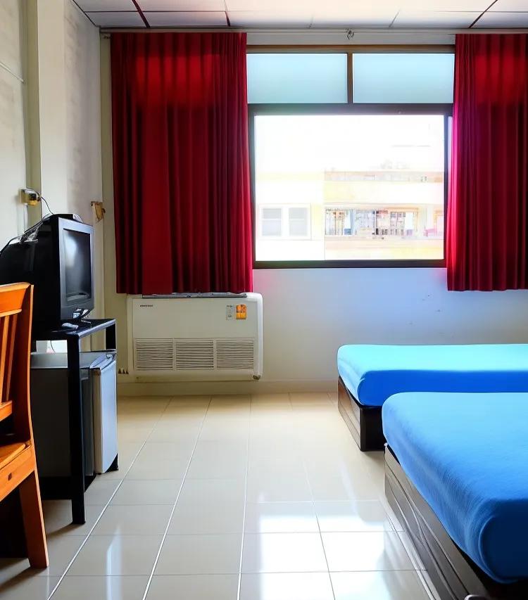 ห้องมาตรฐานเตียงแฝดพร้อมเครื่องปรับอากาศ