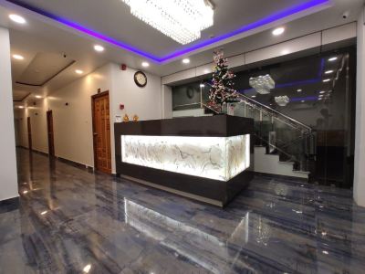 Front Desk Hotel De Pebbles Photo