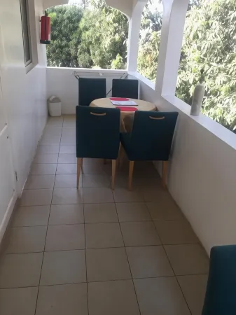 One World Village Guesthouse Отели в г. Bakau