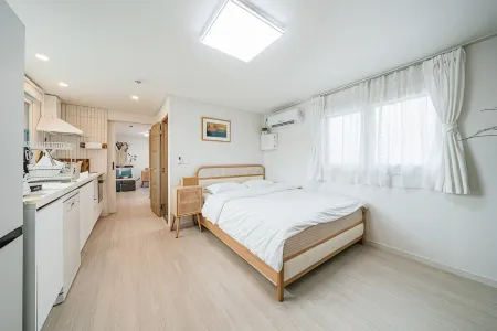 Seogwipo Samchun Camping House Pension Отели рядом с достопримечательностью «Shinhwa Theme Park»