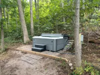 Unique and secluded A frame home on 31 acres with hot tub.