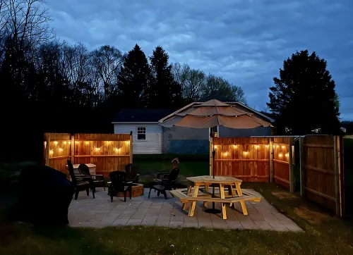 Private Hot Tub, Outdoor TV, near Downtown & Lake Michigan Beaches! - 4-Star