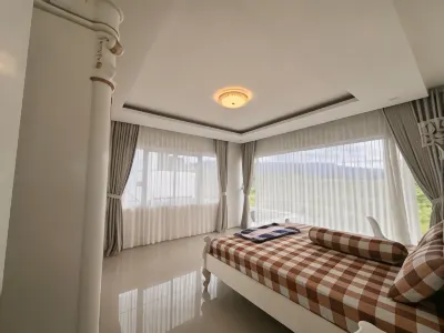 Villa Rumah Putih Ardilla Puncak Hotels in Batu Layang