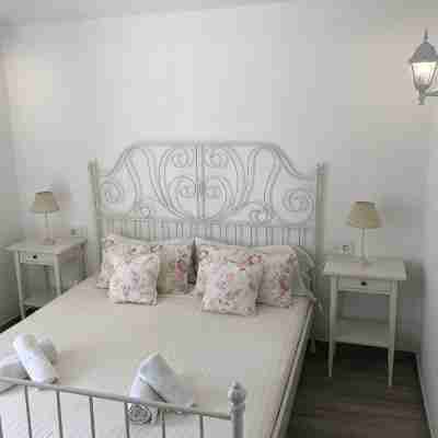 Casa Il Sole. Unifamiliar adosada casa con jardín. Cap D'Artrutx, Menorca. Rooms