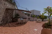Luxury villa with private heated pool in private garden. Close to beaches.
