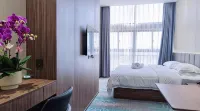 Anning Qifeier Hotel - que admiten mascotas