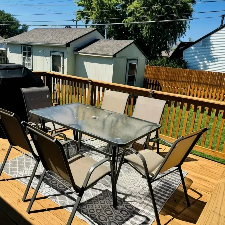 Spacious 4-bedroom house in Great Bend, KS with, Backyard Deck, Ping Pong Table
