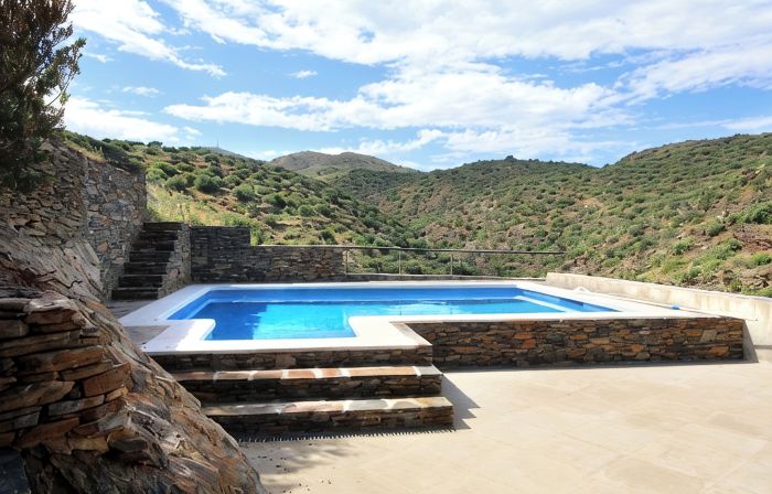 A charming family home with private pool in Cadaques with sea views.
