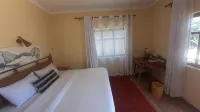 Emirishoi Cottages & Garden Bistro - balcony