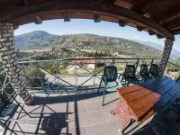 Stone Maisonettes Hotels in Aigialeia