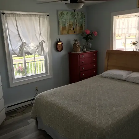 Beautiful corner property with cozy beach vibe.