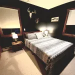 Relaxing Crystal Lake Cottage Retreat - Minutes to the Beach, & Downtown Beulah - 4-Star
