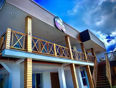 In di House of Reggae Boutique Отели рядом с достопримечательностью «Плайя Спрат Бигт»