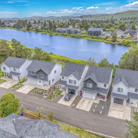 Seaside Riverfront Escape • HotTub • Walk to Beach