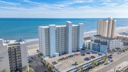 Serenity By The Sea: Modern Beachfront Condo with Stunning Views