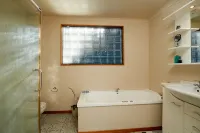 Akaroa Holiday Home.  Spacious, sunny, harbour views and close to town. Sleeps 8 - balcony