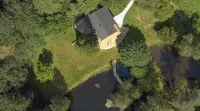 Magnificent chalet on a green island. 2 ponds, private sauna and jacuzzi