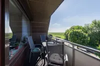 Apartment behind the dike