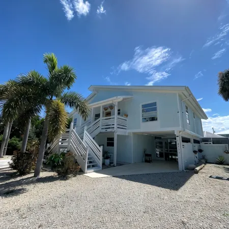 Antigua Cay Retreat is a stylish home with pool on deep water canal in Bokeelia