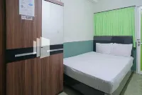 Pondok Hijau Syariah Mitra RedDoorz at Citraland Surabaya Hotels in Sambikerep