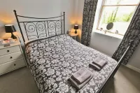 Cuffern Manor Hotels near Next