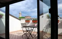 Corte Cavour. An attic in the heart of the city