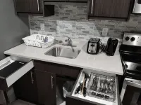 A cozy one bedroom suite located in the peaceful neighborhood of Evergreen.