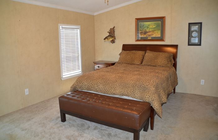 Mid-lake home conveniently located in quiet neighborhood with boat ramp.