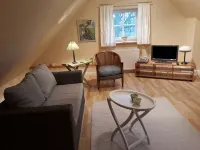 Cozy living under thatch - Apartments