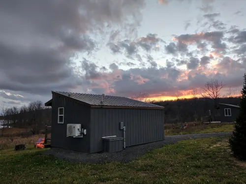 "Twins East" Waterfront property and micro cabin- 10 minutes from Watkins Glen!
