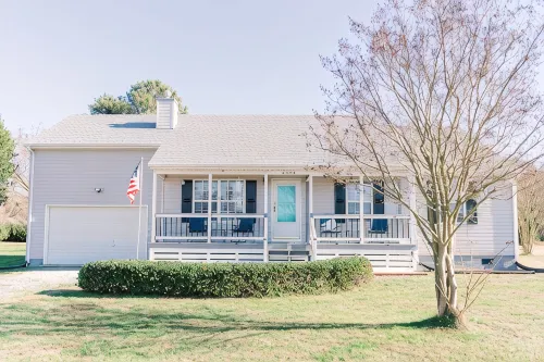 Newly Renovated, 4Bd 2 BA, 1 Full Acre, Sleeps 8, and is Pet Friendly.