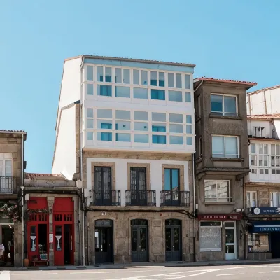 Coliving Compostela Отели рядом с достопримечательностью «Ресторан "Пульперия-ос-Кончейрос"»