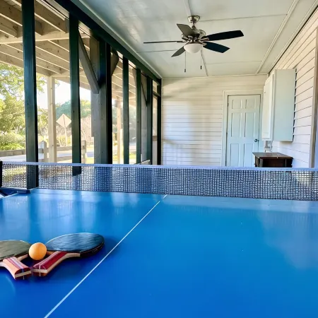 Classic Pawleys. Just Renovated. Long, breezy porches. Steps to beach and creek.