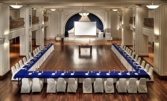 a large conference room with a long table and chairs arranged for a meeting or event at The Phoenicia Malta - The Leading Hotels of the World