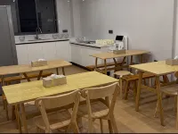 Miyou Smart Homestay (Xingyi Wanfenglin Airport South Railway Station) Hotel di Xingyi