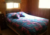 Island Getaway! Nestled in the woods with easy access to sandy beach