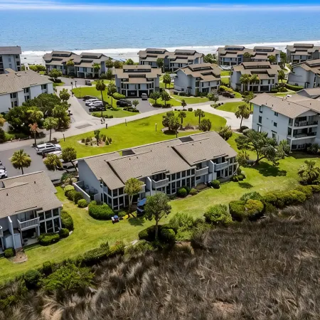Steps from beach, Marsh Front, gated community, pool access, grill, marsh dock.