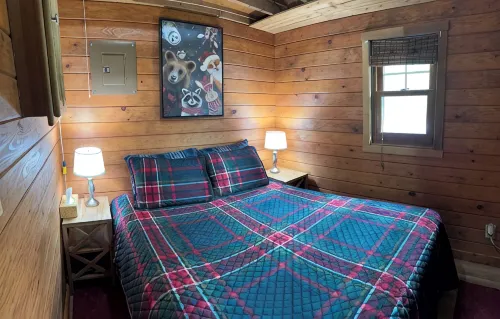 Charming cabin in delightful Duquette with AC near miles of ATV trails.