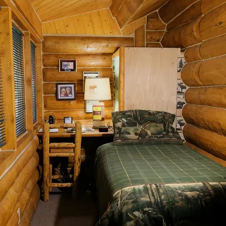 Unique Alaskan log home in trees & wild flowers on 14-acre private homestead.