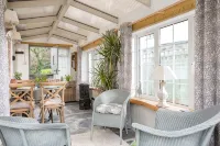 Quirky home with romantic shepherds' hut bedrooms and pretty garden near Padstow