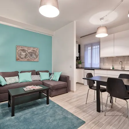 Large apartment between beach and city- With parking and private beach.