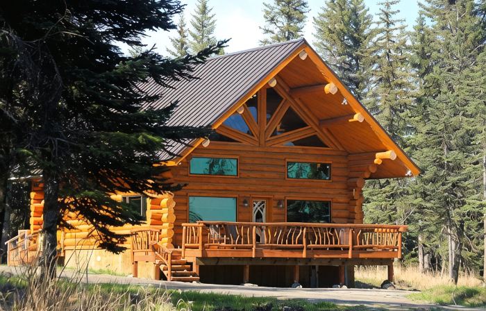 Unique Alaskan log home in trees & wild flowers on 14-acre private homestead.