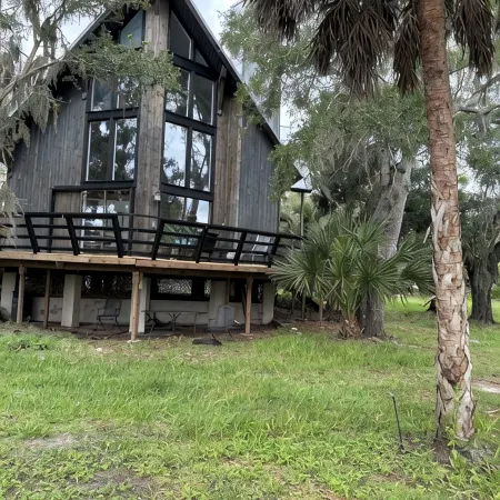 Luxurious house on secluded 3.8 acres, oak trees on Manatee River, large decks