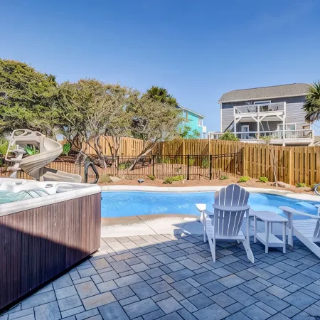 Your Ultimate Retreat – Steps from Beach with Pvt Heated Pool, Slide & Hot Tub!