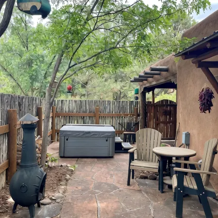 Cozy Casa Carmelita features a Brilliant Kiva Fireplace, Unique Patio & Hot Tub!